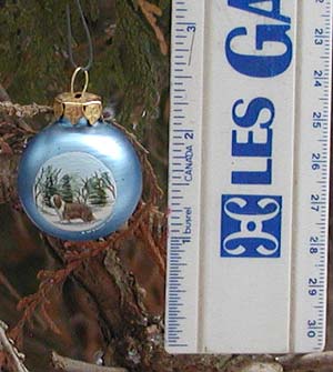 Tiny glass ornament showing size